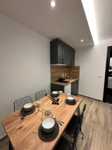 Kuchyň nebo kuchyňský kout v ubytování IO's Apartments