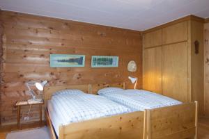 Ein Bett oder Betten in einem Zimmer der Unterkunft Chalet Cresta di Saas