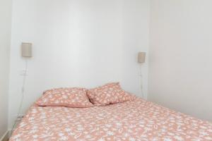 Ένα ή περισσότερα κρεβάτια σε δωμάτιο στο Séjour Élégance au pied du Chateau de Vincennes