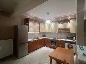 Η κουζίνα ή μικρή κουζίνα στο JENNY'S seaview apartment
