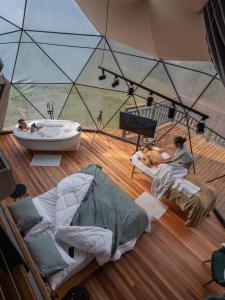 Voodi või voodid majutusasutuse Orion Glamping Hospedagem Domo Geodésico em Urubici toas