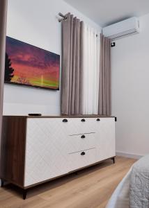 Postel nebo postele na pokoji v ubytování Montflux Hotel