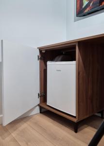 Kuchyň nebo kuchyňský kout v ubytování Montflux Hotel