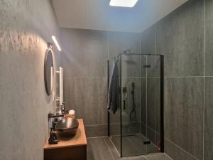 a bathroom with a shower and a sink at Apartament Słoneczny Taras nad Baryczą in Milicz +22 photos