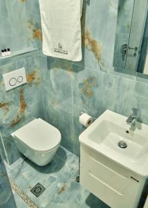 Koupelna v ubytování Montflux Hotel