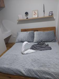 Postel nebo postele na pokoji v ubytování Apartman Pavle