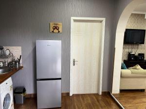 Kuchyň nebo kuchyňský kout v ubytování Dream House