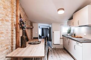 Η κουζίνα ή μικρή κουζίνα στο Fontane Apartments