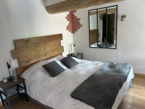 Postel nebo postele na pokoji v ubytování La Marelle