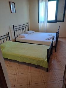 Postel nebo postele na pokoji v ubytování Janis Castle Apartment