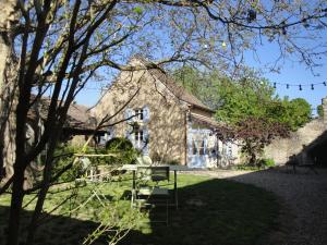 Κήπος έξω από το La Cuverie du Château le Four à Pain