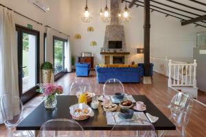 a living room with a table with food on it at Villa Higer in Hondarribia