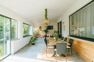 Μια τηλεόραση ή/και κέντρο ψυχαγωγίας στο Therme - Corbeanca by The Lake Luxury Villa