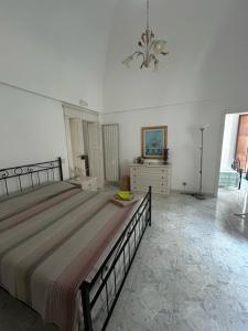Katil atau katil-katil dalam bilik di Appartamento storico in centro