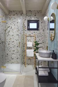 a bathroom with a sink and a shower at Stodoły Babice in Krzywcza +53 photos