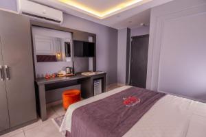 Letto o letti in una camera di Ruby Hotel