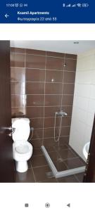 Ένα μπάνιο στο Bino Apartments