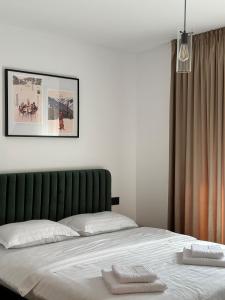 ボルシャにあるNorth Kabanの白いタオルが2枚敷かれたベッド +37枚の写真