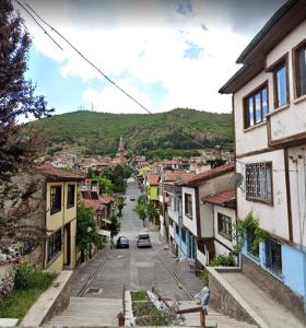 a view of a street in a town with buildings at Afyon kalesi eteklerinde bir yer in Afyon