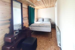 Ένα ή περισσότερα κρεβάτια σε δωμάτιο στο Kotun Gyumri