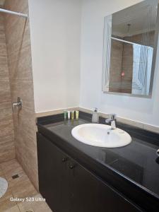 Koupelna v ubytování F36 Samarah Resort Apartment