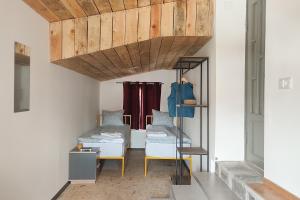 Ένα ή περισσότερα κρεβάτια σε δωμάτιο στο Kotun Gyumri