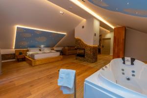 Ένα ή περισσότερα κρεβάτια σε δωμάτιο στο Hotel Jezerca Theth