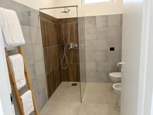 a bathroom with a shower with a toilet at La casa dei Coloni in Nola +61 photos
