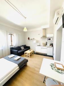 Kuchyň nebo kuchyňský kout v ubytování Apartamentos Templo Diana -Vistas Históricas- + 37 fotografií