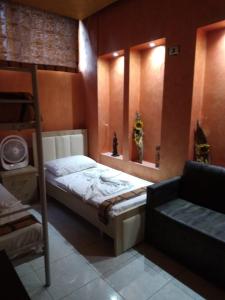 Postel nebo postele na pokoji v ubytování Hotel Hostel J'adore