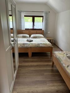 Postel nebo postele na pokoji v ubytování Apartmán pod Pálavou