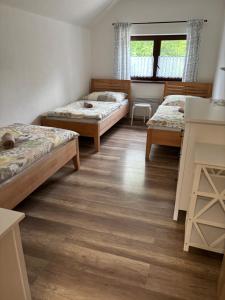 Postel nebo postele na pokoji v ubytování Apartmán pod Pálavou