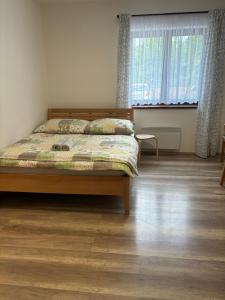 Postel nebo postele na pokoji v ubytování Apartmán pod Pálavou