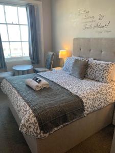 The Jubilee Hotel West- with Spa Facilities & Smokehouse - NEWLY REFURBISHED FACILITIES客房内的一张或多张床位