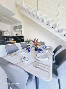 Kuchyň nebo kuchyňský kout v ubytování B36 Loft Apartment Samarah Resort