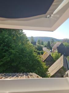 a view from the window of a house at Hotel Neue Krone in Markt Erlbach
