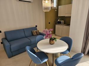 Kuchyň nebo kuchyňský kout v ubytování Gabbiano Suites