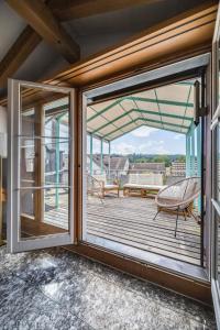 Balkón nebo terasa v ubytování Atemberaubendes Apartment mit Dachterrasse
