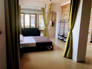 Krevet ili kreveti u jedinici u okviru objekta Loft in Aplotaria