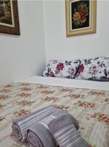 Postel nebo postele na pokoji v ubytování Quartos na Montanha