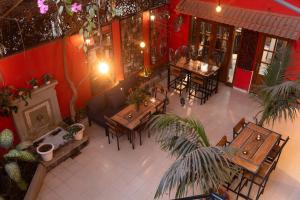 an overhead view of a restaurant with tables and chairs at Loman Art in Dakar