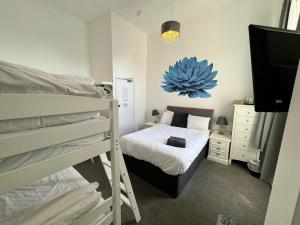 The Jubilee Hotel West- with Spa Facilities & Smokehouse - NEWLY REFURBISHED FACILITIES客房内的一张或多张床位