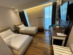 TV a/nebo společenská místnost v ubytování Arberia Palace Hotel