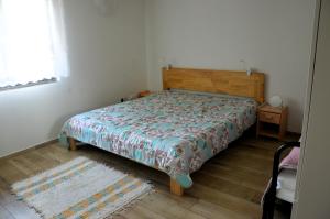 Кровать или кровати в номере Romantická chalupa na laze