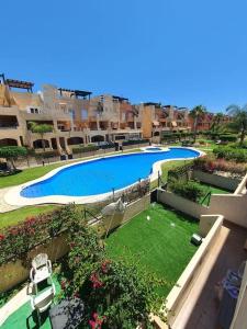 an aerial view of a swimming pool in a apartment at Paraíso Vera Playa in Playas de Vera