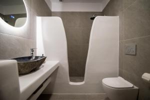 a bathroom with a sink and a toilet at Grey Comfort in Glinado Naxos +22 photos