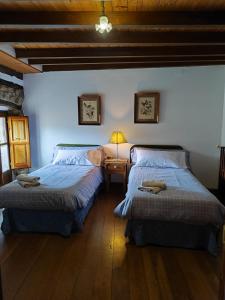 Posteľ alebo postele v izbe v ubytovaní Casa Simón