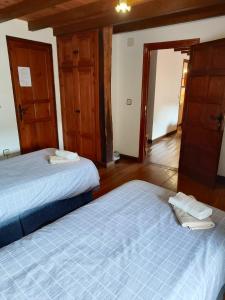 Posteľ alebo postele v izbe v ubytovaní Casa Simón