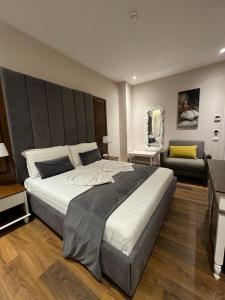Postel nebo postele na pokoji v ubytování Arberia Palace Hotel