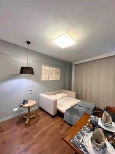 Cama o camas de una habitación en Flat Ipanema com Garagem